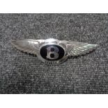 A vintage motor car badge - Bentley
