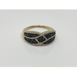 A 9ct gold diamond set ring, size P CONDITION REPORT: 3.