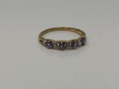 A 9ct gold tanzanite set ring, size O CONDITION REPORT: 1.