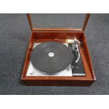 A Thorens TD-150 turntable together with a pair of Rogers teak cased speakers