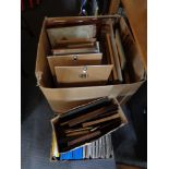 A large box of pictures and prints, frames,