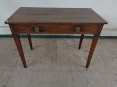 A nineteenth century mahogany side table fitted with a drawer