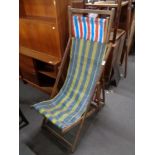 Two vintage wooden folding deck chairs