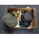 A box of military caps, canvas bag, cricket cap,