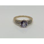 A 9ct gold gem set dress ring, size N CONDITION REPORT: 2.