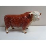 A large china model of a Hereford bull by Melba