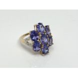 A 9ct gold tanzanite cluster ring, size N CONDITION REPORT: 4.