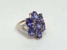 A 9ct gold tanzanite cluster ring, size N CONDITION REPORT: 4.