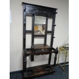 A Victorian oak mirrored hall stand