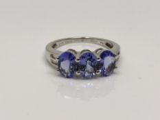 A 9ct gold tanzanite and diamond ring, size N CONDITION REPORT: 2.