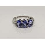 A 9ct gold tanzanite and diamond ring, size N CONDITION REPORT: 2.