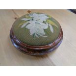 A Victorian tapestry circular stool