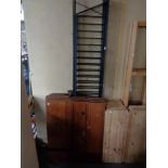 A mid century Ladderax teak and metal wall system.