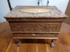 An Eastern hardwood lift top storage box with drawer together with a magazine rack