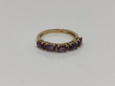 A 9ct gold amethyst ring, size N CONDITION REPORT: 2.