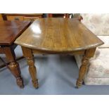 A nineteenth century oak dining table