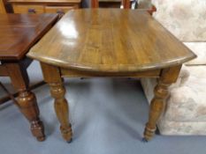 A nineteenth century oak dining table