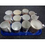 A tray of antique commemorative beakers, coronation souvenirs,