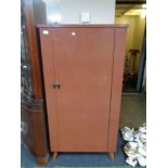 A Formica veneered storage cupboard