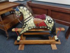 A mid century painted wooden rocking horse by Collinson CONDITION REPORT: 122cm