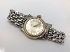 A lady's stainless steel Oris automatic calendar wristwatch with visible movement