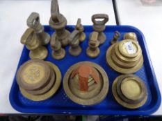 A tray of brass weights,