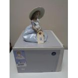 A Lladro figure - Bunny Kisses, 06741, boxed.