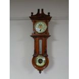 A Victorian clock barometer wall piece