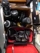 A box of Canon FTb camera, Canon T50, Canon 400D digital camera, further lenses.