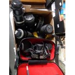 A box of Canon FTb camera, Canon T50, Canon 400D digital camera, further lenses.