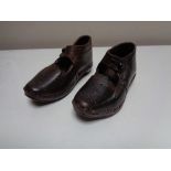 A pair of Victorian leather studded child's clogs (2) CONDITION REPORT: Approximate