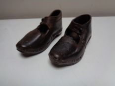 A pair of Victorian leather studded child's clogs (2) CONDITION REPORT: Approximate