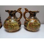 A pair of Oriental style gilded ewers (2)