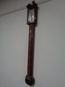 A mahogany nineteenth century stick barometer