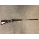 A 19th century single barreled percussion cap sporting gun, walnut stock, scroll trigger guard,