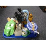 A tray of metal figure on plinth, Ringtons china teapot, ceramic table clock,