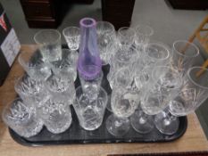 A tray of crystal and glass ware.