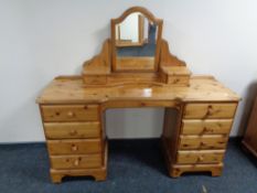 A Ducal pine dressing table with stool