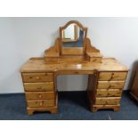 A Ducal pine dressing table with stool