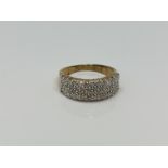 A 9ct gold diamond set ring, size O CONDITION REPORT: 4.