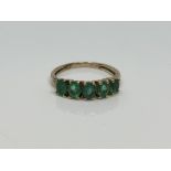 A 9ct gold emerald set ring,
