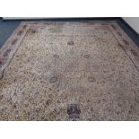 A large machine made Persian designed carpet 320 cm x 440 cm.