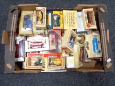 A crate of die cast model vehicles etc