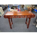 A Chinese hardwood serving table