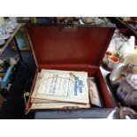 A vintage deed box containing garage and motor agent manuals, die cast vehicle, vintage clippers,