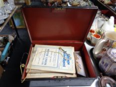 A vintage deed box containing garage and motor agent manuals, die cast vehicle, vintage clippers,