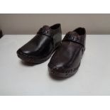 A pair of Victorian leather studded child's clogs (2) CONDITION REPORT: Approximate