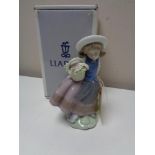 A Lladro figure - Sweet scent, 05221, boxed.