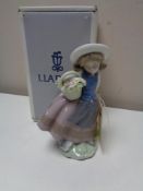 A Lladro figure - Sweet scent, 05221, boxed.