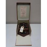 An early twentieth century Dinkie crystal set issued by the Tyneside radio company,